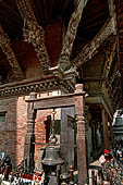 Patan Durbar Square - Bhimsen temple, detail of the roof struts. 