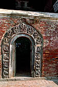 Patan Durbar Square - the Royal Palace one of the entrances leading to minor chowks. 