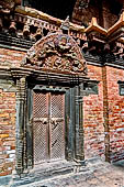 Patan Durbar Square - the Royal Palace, Mul Chowk. Torana. 