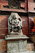 Patan Durbar Square - the statue of Narisingha on the south side of the square in front of the Royal Palace facade. 