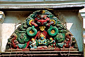 Swayambhunath Stupa - the temple of Santipura, torana above the temple door.