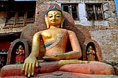 Swayambhunath Hill - big statue of Aksobhya with the gesture to touch earth, near the temple of Santipura.