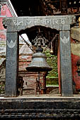 Sankhu - Vajra Jogini Temple. The great bell in front of the temple.