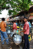 Orissa - Bhubaneswar, pilgrims, mendicants and colourful stalls near Lingaraja.