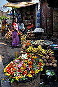 Orissa - Bhubaneswar, pilgrims, mendicants and colourful stalls near Lingaraja..