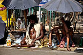 Orissa - Bhubaneswar, pilgrims, mendicants and colourful stalls near Lingaraja..