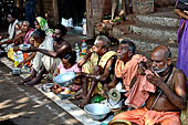 Orissa - Bhubaneswar, pilgrims, mendicants and colourful stalls near Lingaraja..