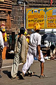 Orissa - Bhubaneswar, pilgrims, mendicants and colourful stalls near Lingaraja.