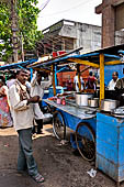 Orissa - Bhubaneswar, pilgrims, mendicants and colourful stalls near Lingaraja.