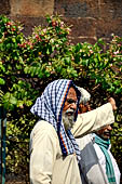 Orissa - Bhubaneswar, pilgrims, mendicants and colourful stalls near Lingaraja.