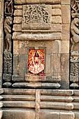 Orissa - Bhubaneswar, Brahmesvara temple. On the northern face of the deul there is a small image of Lakshmi covered in red cloth