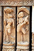 Orissa - Bhubaneswar, Brahmesvara temple. Images of dancing girls on the balusters of  the lattice-windows of the jagamohana