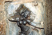 Hirapur - the Sixtyfour Yoginis Temple, Yogini n 39 shooting with a bow.