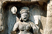 Hirapur - the Sixtyfour Yoginis Temple, detail of the head of Yogini n 46, she is holding a trident.