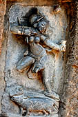 Hirapur - the Sixtyfour Yoginis Temple, Yogini n 39 (clockwise), two armed figure mounting on a rat. She is shooting with a bow.