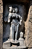 Hirapur - the Sixtyfour Yoginis Temple, Yogini n 45 (clockwise), four armed figure mounted on a pot. There is a vase on her left.