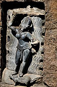 Hirapur - the Sixtyfour Yoginis Temple, Yogini n 52 (clockwise), two armed figure mounted on a ram. She has a raised sword and she is sourrounded by flames.