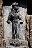 Hirapur - the Sixtyfour Yoginis Temple, Yogini n 55 (clockwise), two armed graceful figure standing on a yak. Note the beautiful braid of hair.