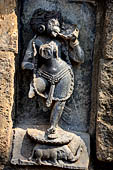 Hirapur - the Sixtyfour Yoginis Temple, Yogini n 3 (clockwise), two armed standing on an elephant. She wears a garland of skulls and various ornaments. She is drinking from a skull cup.