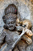 Hirapur - the Sixtyfour Yoginis Temple, head detail of Yogini n 22 (clockwise) with the string instrument.