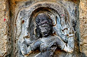 Hirapur - the Sixtyfour Yoginis Temple, head detail of Yogini n 20 (clockwise) rising an elephant skin.