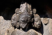 Hirapur - the Sixtyfour Yoginis Temple, detail of the three faced head of Yogini n 51 (clockwise).