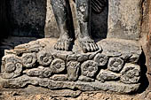 Hirapur - the Sixtyfour Yoginis Temple, detail of the pedestal of Yogini n 47 (clockwise) with lotus flowers.