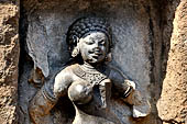 Hirapur - the Sixtyfour Yoginis Temple, head detail of Yogini n 44 (clockwise) with curling hair.