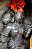 Hirapur - the Sixtyfour Yoginis Temple, Yogini n 30, two armed figure mounting on a peacock.