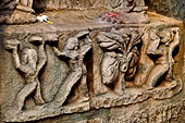 Hirapur - the Sixtyfour Yoginis Temple, right side wall of the vestibule, detail of the pedestal of the male image.