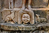 Hirapur - the Sixtyfour Yoginis Temple, pedestal of Katyayani n 3 (clockwise), with a jackal and a dog.