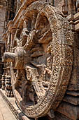 Konarak - Orissa. The Sun Temple, details of the twelve pairs of the great wheels arrayed along the platform.  