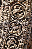 Konarak - Orissa. The Sun Temple, details of the twelve pairs of the great wheels arrayed along the platform.  