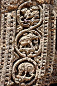 Konarak - Orissa. The Sun Temple, details of the twelve pairs of the great wheels arrayed along the platform.  