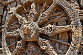 Konarak - Orissa. The Sun Temple, details of the twelve pairs of the great wheels arrayed along the platform.  