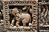 Orissa - Konarak - The Sun Temple. The frieze which runs continously all  around the base of the temple platform, decorated with more than ten thousands elephants .  