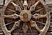 Konarak - Orissa. The Sun Temple, details of the twelve pairs of the great wheels arrayed along the platform.  