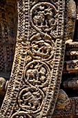 Konarak - Orissa. The Sun Temple, details of the twelve pairs of the great wheels arrayed along the platform.  