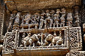 Konarak - Orissa. The Sun Temple, detail of the platform decoration, scene of the king worshipping the Shiva-liga , Jagannath and the Shakti Goddess Durga. 