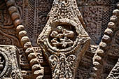 Konarak - Orissa. The Sun Temple, details of the twelve pairs of the great wheels arrayed along the platform.  