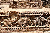 Orissa - Konarak - The Sun Temple. The frieze which runs continously all  around the base of the temple platform, decorated with more than ten thousands elephants .  