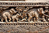 Orissa - Konarak - The Sun Temple. The frieze which runs continously all  around the base of the temple platform, decorated with more than ten thousands elephants .  