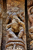 Konarak - Orissa. The Sun Temple, detail of the richly decorated high platform of the jagamohana-deul complex. 