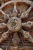 Konarak - Orissa. The Sun Temple, details of the twelve pairs of the great wheels arrayed along the platform.  