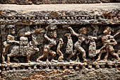 Orissa - Konarak - The Sun Temple. The frieze which runs continously all  around the base of the temple platform, decorated with more than ten thousands elephants .  