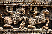 Orissa - Konarak - The Sun Temple. The frieze which runs continously all  around the base of the temple platform, decorated with more than ten thousands elephants .  