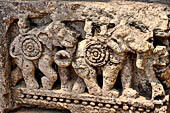 Orissa - Konarak - The Sun Temple. The frieze which runs continously all  around the base of the temple platform, decorated with more than ten thousands elephants .  