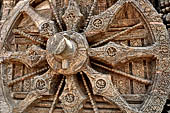 Konarak - Orissa. The Sun Temple, details of the twelve pairs of the great wheels arrayed along the platform.  