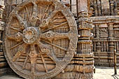 Konarak - Orissa. The Sun Temple, details of the twelve pairs of the great wheels arrayed along the platform.  