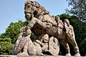 Orissa - Konarak - The Sun Temple. The war horses statues guarding the north staircase leading to the jagamohan.